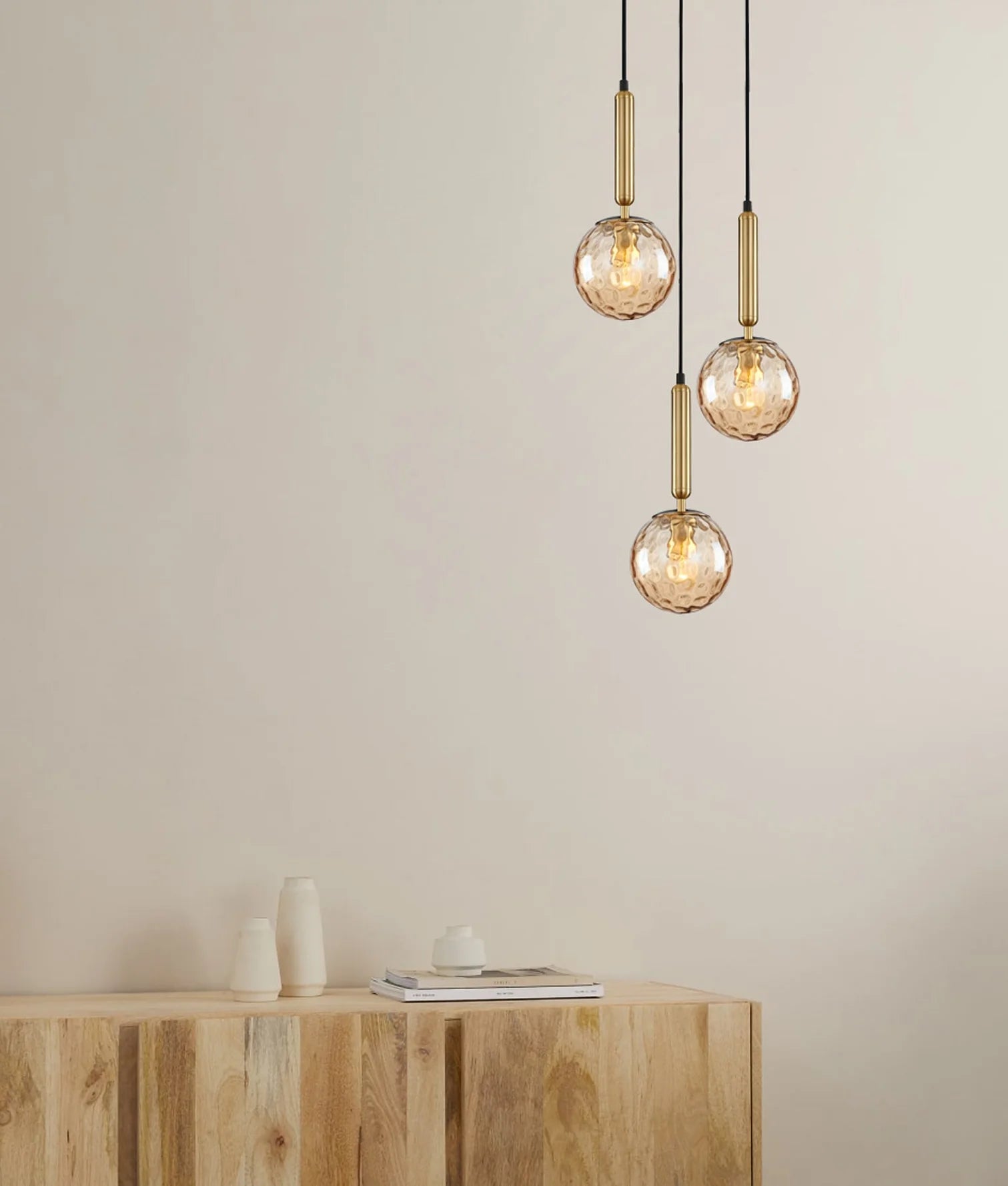 CLA TRATTINO: Interior Bronze Amber / Smokey Black Spherical Glass Multiple Round Base Pendant Lights